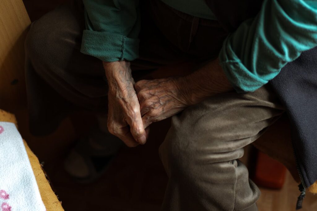 pexels-photo-29372535 Close-up of a senior woman's hands, symbolizing wisdom and care.